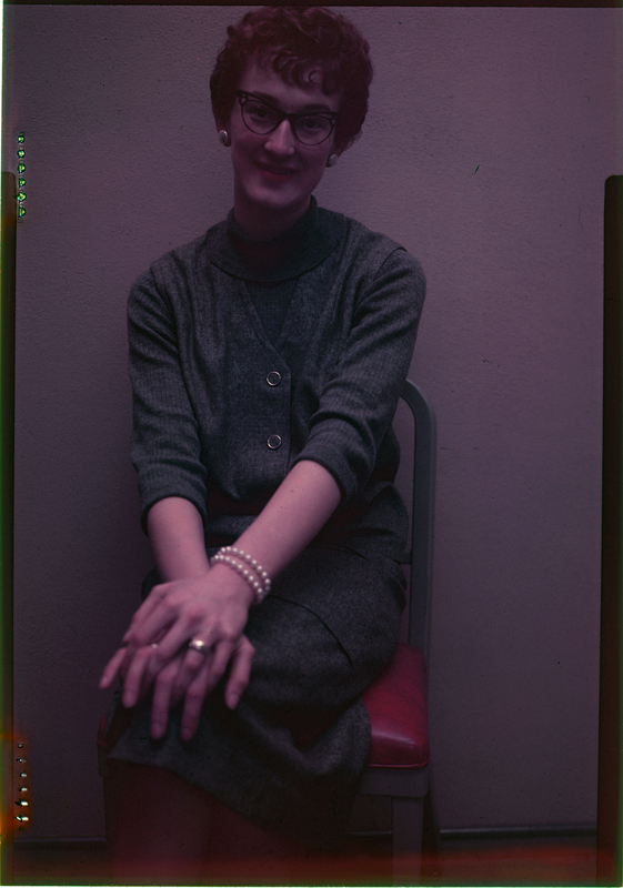 Photo of Dorothy S. Murphy sitting down. She is wearing nice clothes, jewelry, and is looking at the camera.