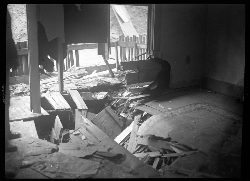 Photo of the damage done to the interior of Peter Paulson's home which was caused by a rock slide near Big Creek, Idaho.