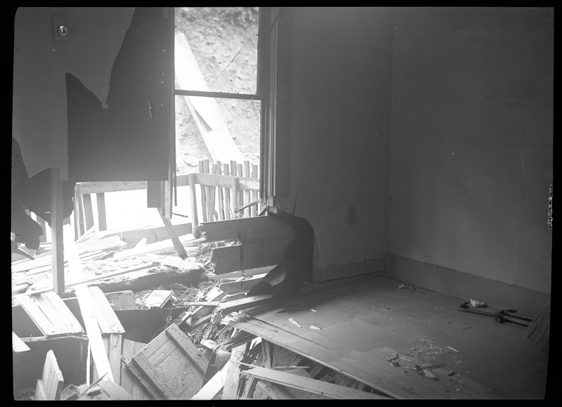 Photo of the damage done to the interior of Peter Paulson's home which was caused by a rock slide near Big Creek, Idaho.