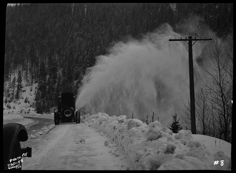 Photo of a snow blower removing snow from the road at Lookout Pass. The snow plower is referred to as Snow-Go Plow.