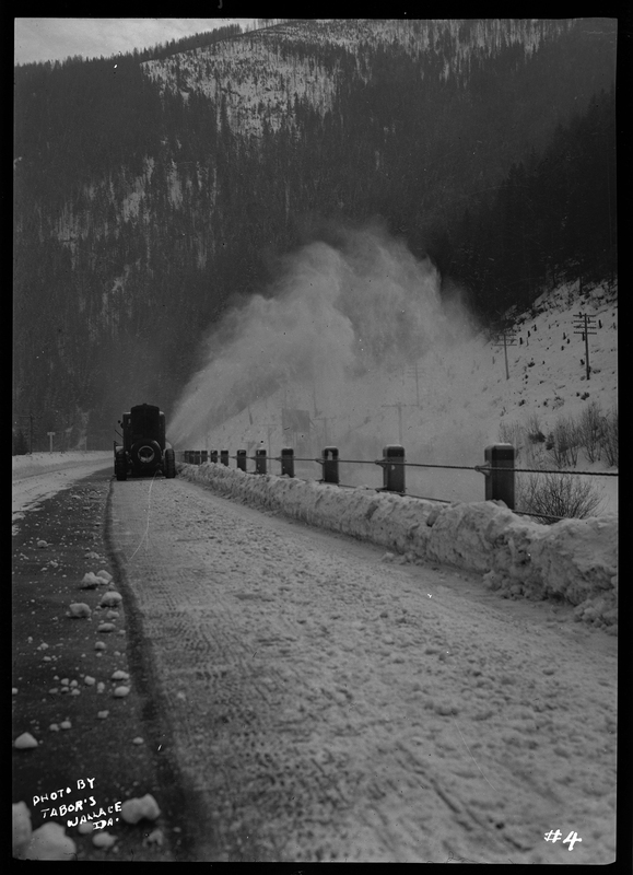 Photo of a snow blower removing snow from the road at Lookout Pass. The snow plower is referred to as Snow-Go Plow.