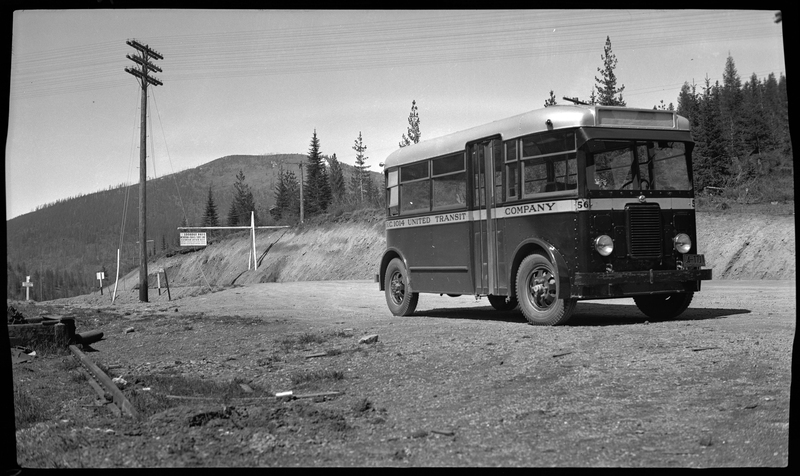 Photo of an United Transit Company Bus parked on the side of the road at Lookout Pass.