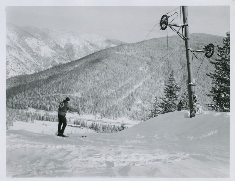 An emergency ski patrolman looks over one of the hills at Lookout Pass.