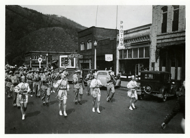 Majorettes lead a marching band along the parade route for the Benevolent and Protective Order of Elks parade.
