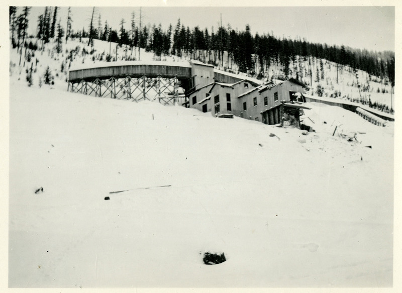 Snow covers a building at Jack Waite mine.