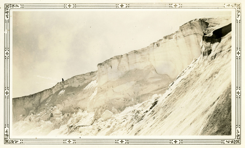 A person stands at the edge of the ridge at Jack Waite mine.