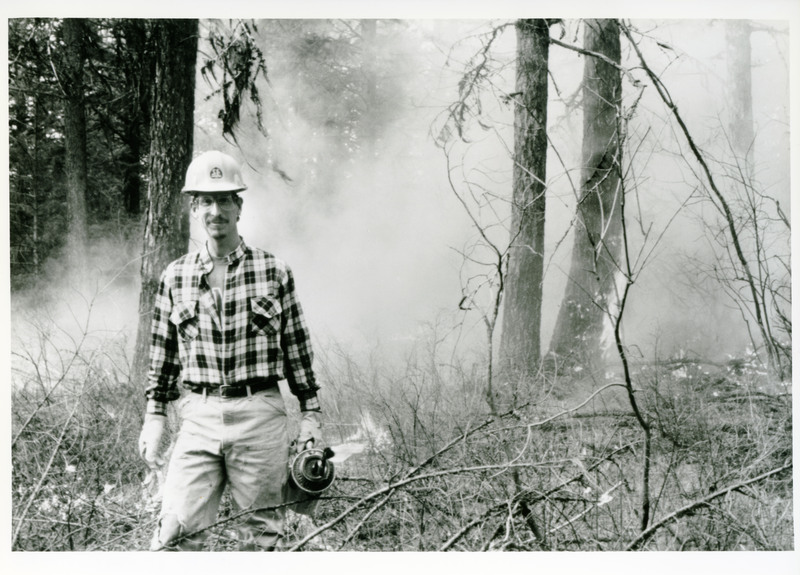 Student Jeff Fields on a prescribed burn on Moscow Mountain with professor Harold Osborne.