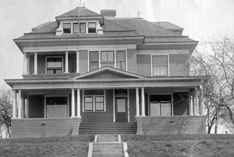 Photograph of the Alpha Kappa Epsilon House. This house was converted into an auxiliary hospital for patients with mild symptoms of the influenza.