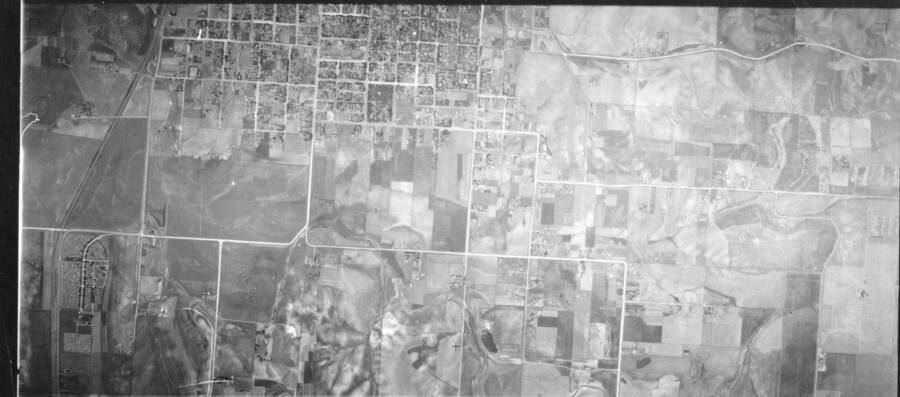 Black and white 1934 vertical air photo taken from aircraft, by the Washington National Guard.  Corresponds with C Index 7