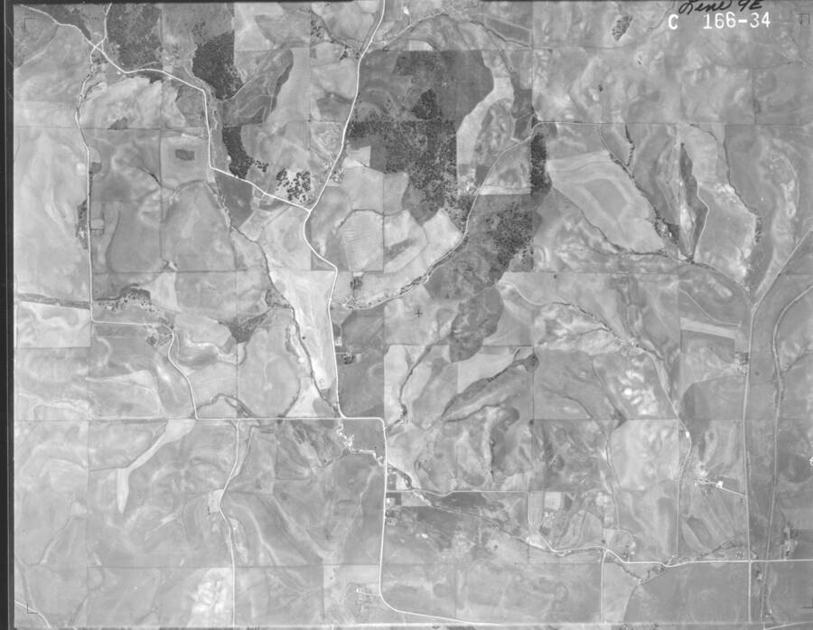 Black and white 1934 vertical air photo taken from aircraft, by the Washington National Guard.  Corresponds with C Index 7