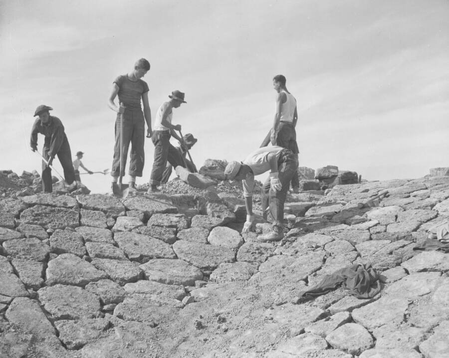 CCC workers from Mountain Home Camp G-99 nearly finished with a stone incline or retaining wall. Image part of CCC-Idaho Indian Division.