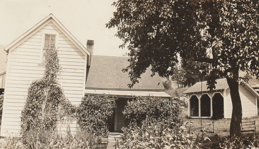 Photo caption: 'New house built for Edna Homer, Indian, Kooskia, Idaho, July 25, 1928.' This image is part of a report to the Commissioner of Indian Affairs, C.H. Burke, on the Fort Lapwai Indian Agency and School.