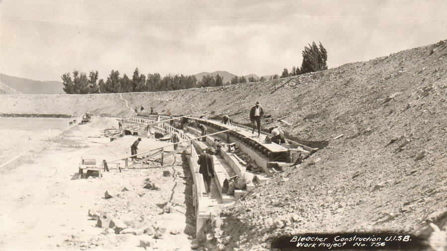 Construction of the bleachers for the Stadium at the University of Idaho - Southern branch now the Quad at Idaho State University. Note: This image is part of a Work Progress Administration publicity series.