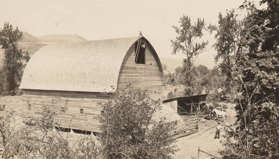 Photo caption: 'New Barn - David Lookingglass, Kamiah, Idaho, Nez Perce Indian, July 25, 1928.' This image is part of a report to the Commissioner of Indian Affairs, C.H. Burke, on the Fort Lapwai Indian Agency and School.