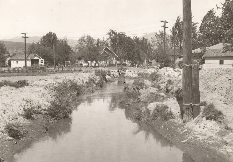 A view of Sand Creek before a rip-rap control channel was installed by WPA. Note: This image is part of a Work Progress Administration publicity series.