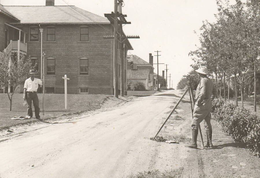 Two men survey the area around the Veteran's Hospital in Boise. Note: This image is part of a Work Progress Administration publicity series.
