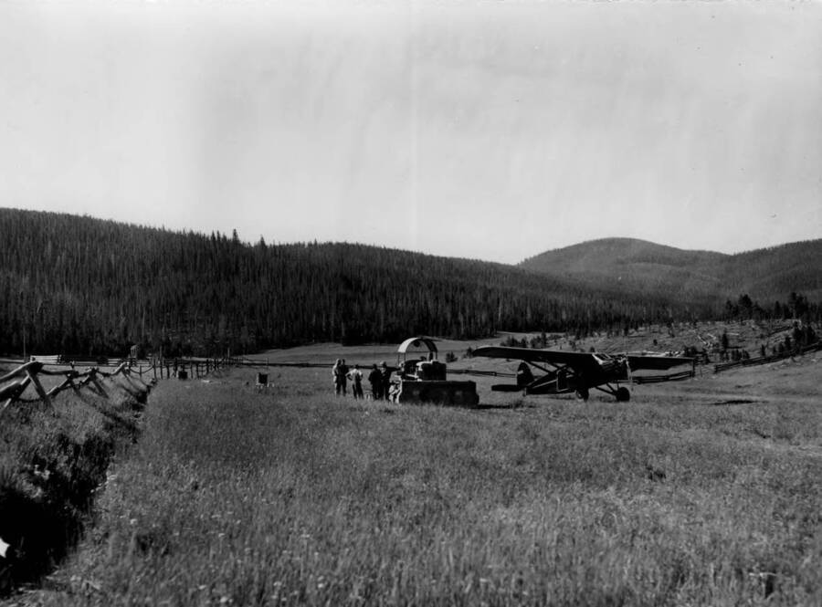 Photo text: 'Aug. 7, 1955.' Chamberlain air field?