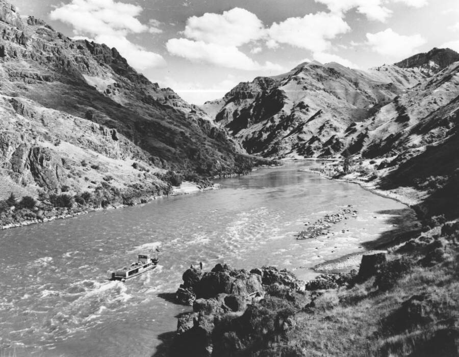 Photo text: 'The border area between Idaho and Washington on the twisting Snake River. The mail boat was the only link between people on ranches.'