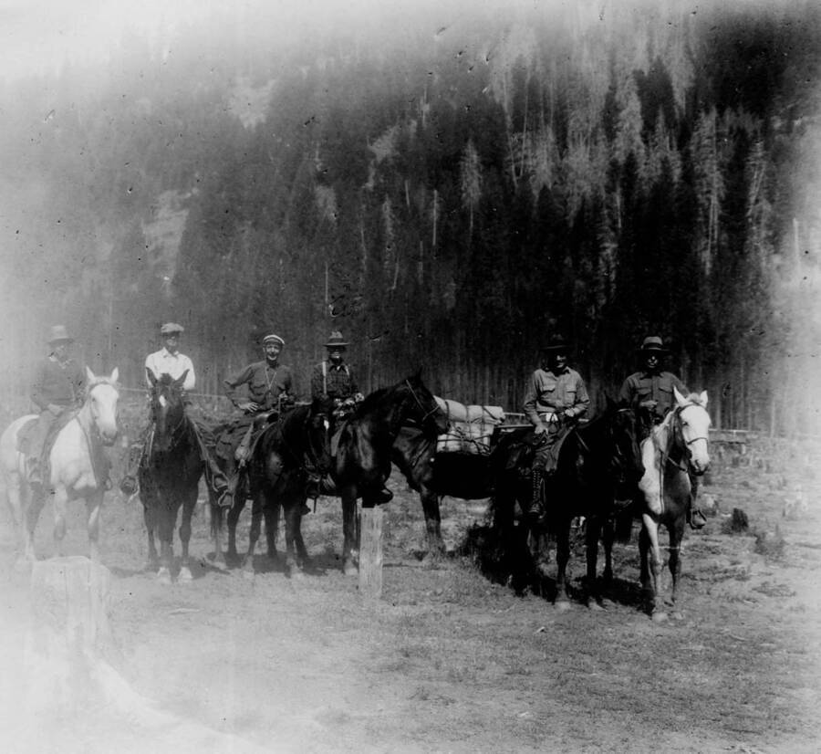 Photo text: 'End of trail at Big Creek Headquarters, men on horses.'