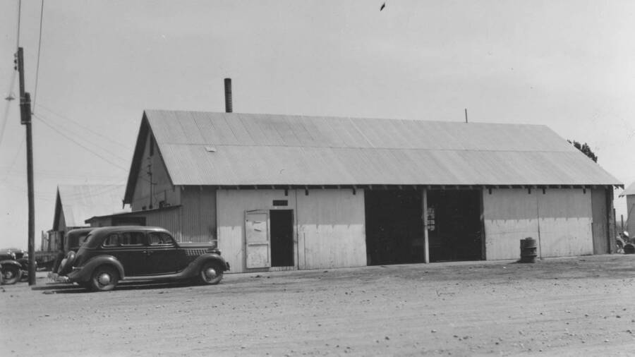 CCC-Idaho shop. A car sits outside. Note: This image is part of a report by V.W. Balderson to Director of Indian Affairs, D.E. Murphy on CCC-Indian Division Projects completed by the Fort Hall Agency, Fort Hall, Idaho.