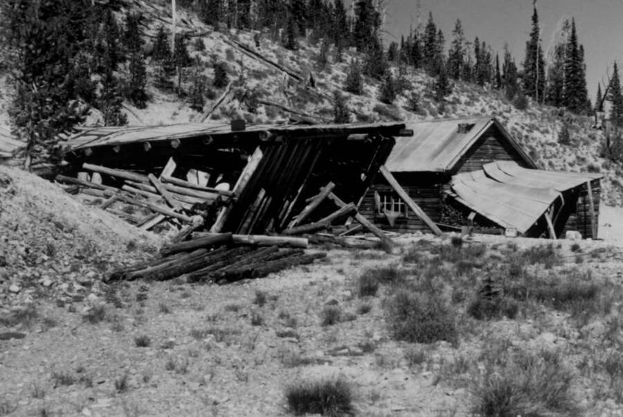 Photo text: 'Photo #1. Mine and cabin in the head of Forty Five Creek. Typical of mining operations served by roads inside the study area.'