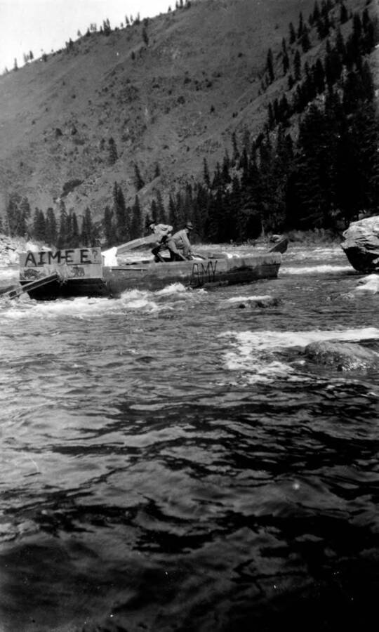 A boat navigating the Power House Rapids on the Salmon River in the Salmon-Challis National Forest.