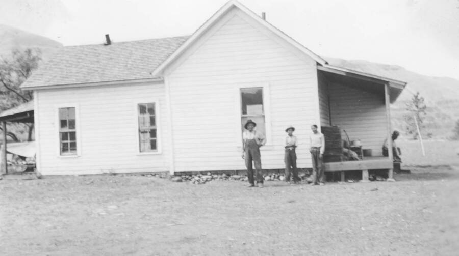 Photo caption: 'The finished house is worth looking at.' This image is part of a report regarding farm organizations among tribes in Northern Idaho and the CCC-Indian Division.