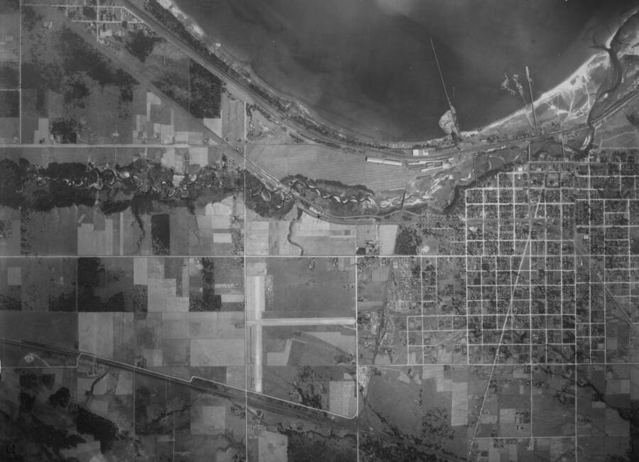 Vertical aerial image of Sandpoint and Lake Pend Oreille near the outlet of the Pend Oreille River (1 of 2).
