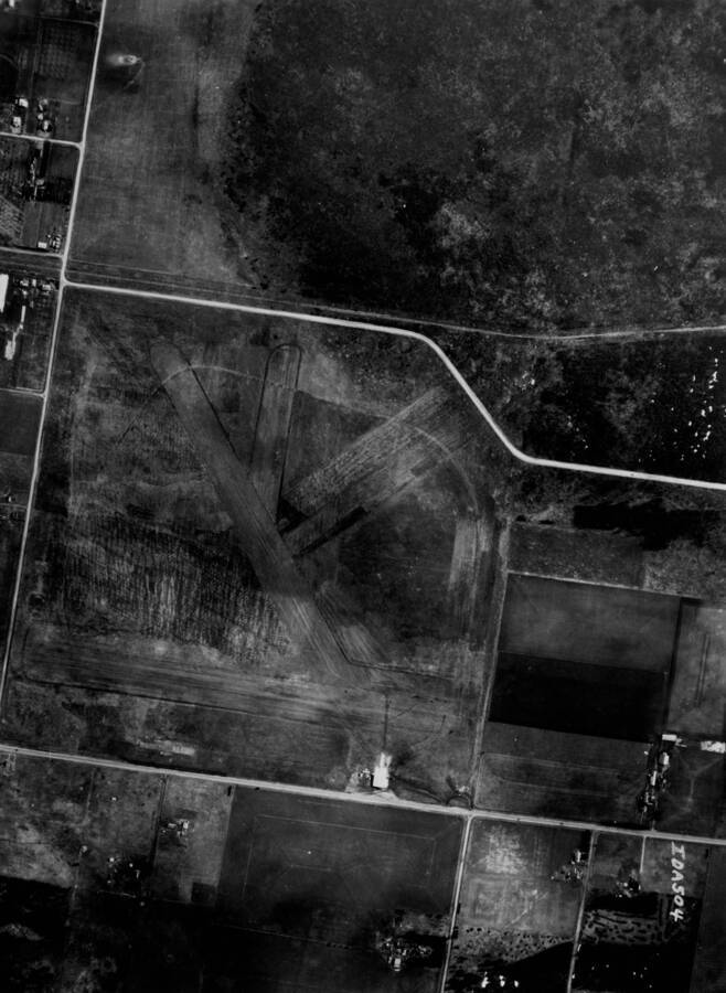 Aerial image of proposed site for Weeks Field. The first airfield in Coeur d'Alene and, by some sources, the first municipally owned airport in the United States. Closed in the 1940's or 50's it was located on the site of the current Kootenai County Fairgrounds.