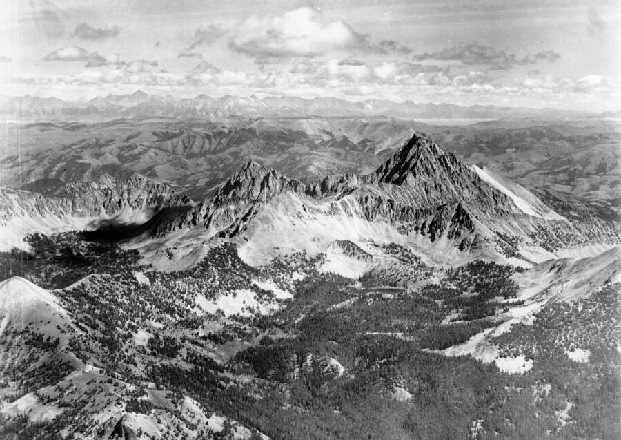 Photo caption: 'Looking approximately east. Large peak in right center is Castle Peak in White Cloud Peaks.'