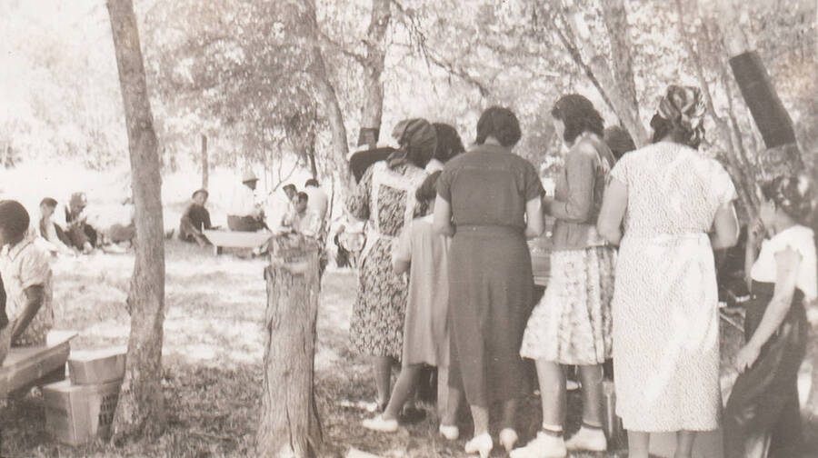 Line for the garden celebration picnic. This image is part of a report regarding farm organizations among tribes in Northern Idaho and the CCC-Indian Division.