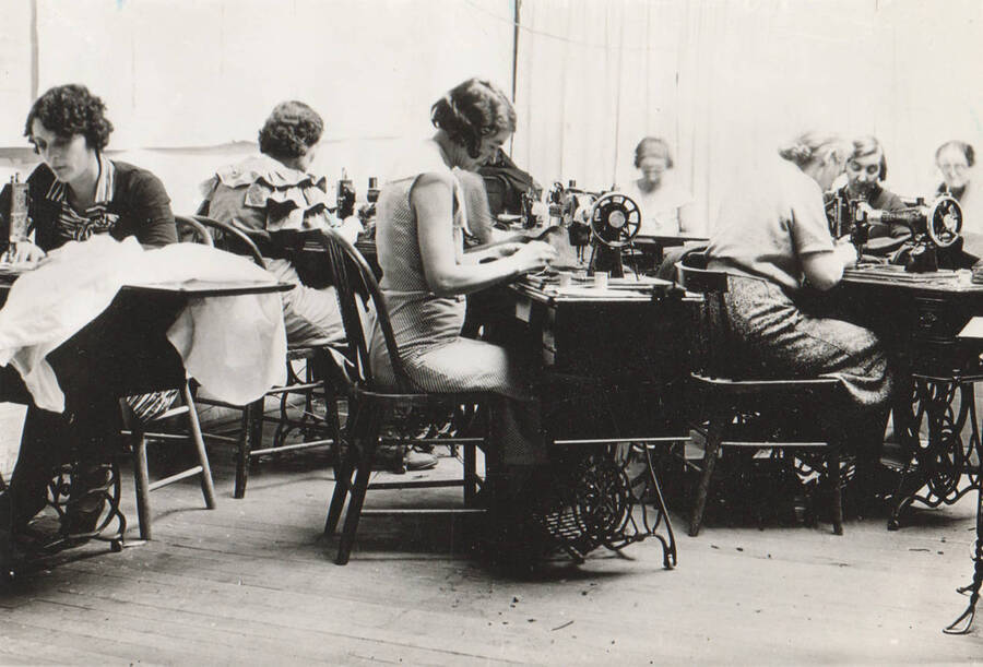 Photo text: 'Idaho, Nampa, Canyon County, A group of women at work in a corner of a WPA sewing room in Nampa, Idaho.' Note: This image is part of a Work Progress Administration publicity series.