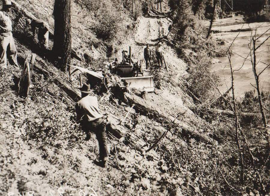 Photo text: 'Camp and construction scenes of Boise King U.S. Forest Service-WPA project to build forest road from Arrowrock Dam to Atlanta in Elmore County.' Note: This image is part of a Work Progress Administration publicity series.