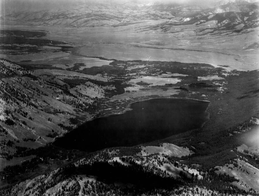 Photo caption: 'Looking northwest over Alturas Lake. The small lake at the lower end of Alturas Lake is Perkins Lake. At the upper left a part of Pettit Lake is seen. The main drainage in the valley is the Salmon River which flows to the upper left. The valley is called Sawtooth Valley.'