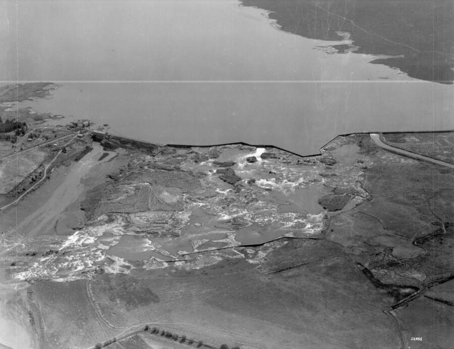 Photo text: 'Minidoka Dam and Reservoir near Rupert, showing canals on each side of river. Below the dam may be seen a diversion dam for the purpose of protecting the lands in the foreground from inundation.' This image is part of a series of aerials taken by the Army Air Corps.
