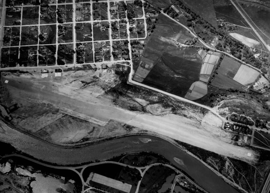 Aerial image and survey of historical Boise Airport near Boise River, the current site of Boise State University
