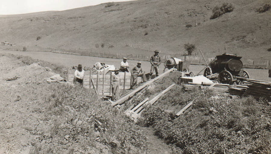 Photo text: 'Soldier's Irrigation Ditch Dam for control of water being built by Indian crew. Nez Perce Reservation, May, 1938.' Note: This image is part of a pictorial supplement to a report on the North Idaho Agency and the Civilian Conservation Corps - Indian Division by Sidney L. Johnston, Assoc. Forest Engineer.