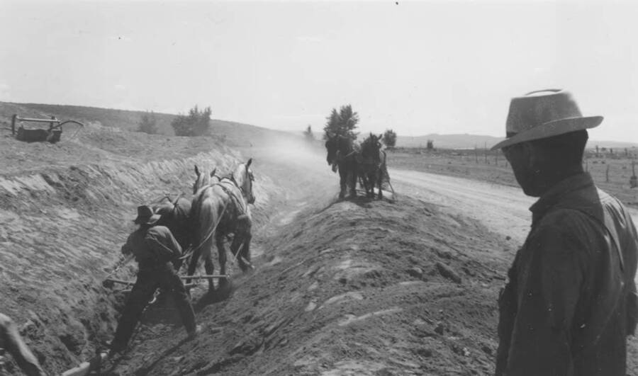 A team work on a ditch. Note: This image is part of a report by V.W. Balderson to Director of Indian Affairs, D.E. Murphy on CCC-Indian Division Projects completed by the Fort Hall Agency, Fort Hall, Idaho.