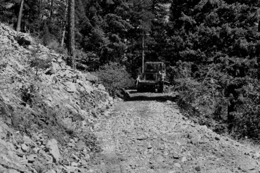 Big Creek Road, tractor working on Copper Camp