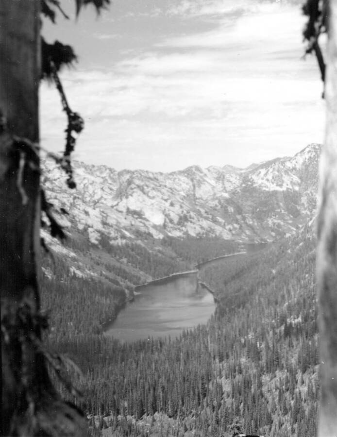 Photo text: 'Big Creek Lake from Pearl Lake Pass - Looking N. to Idaho line - site of proposed Skyline Trail. Lake farmer reservoired - in Wilderness.' This image is part of a series recording trail work and outdoor education in the Bitterroot National Forest.