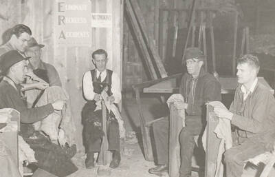 Men working to scrape and tan hides for relief coats at the Boise, Idaho Tannery. Note: This image is part of a Work Progress Administration publicity series.