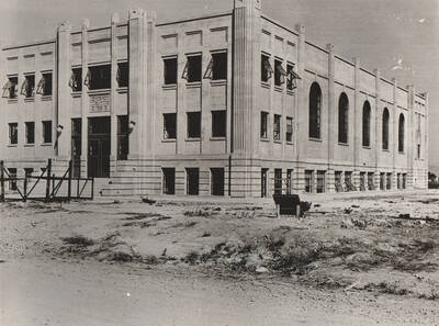 Photo text: 'Gymnasium and Auditorium constructed of solid concrete by WPA workers. Arched west windows and leaded panes allow entrance of light.'  Note: This image is part of a Work Progress Administration publicity series.