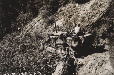 Photo text: 'Camp and construction scenes of Boise King U.S. Forest Service-WPA project to build forest road from Arrowrock Dam to Atlanta in Elmore County.' Note: This image is part of a Work Progress Administration publicity series.