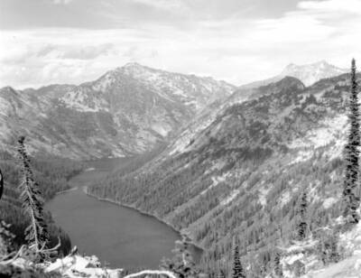 Photo text: 'Big Lake Creek from Pack Box Pass - St. Mary's L.O. and Heavenly Twin Peaks to right - In Bitterroot Wilderness.' This image is part of a series recording trail work and outdoor education in the Bitterroot National Forest.