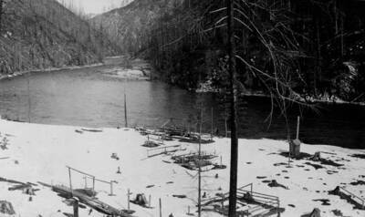 Bungalow Ranger Station site in winter and North Fork, building in progress
