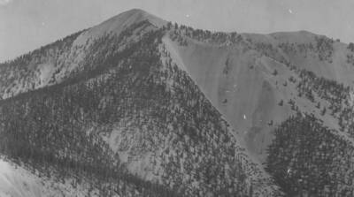 Photo text: 'Altitude 9,500 feet. Completely covered by mining locations.' This is image is part of a report on lands found unsuitable for reserve purposes.