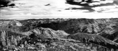 Photo text: 'Looking southeasterly down from Big Creek. Horse Mountain to left.' Pack train in lower right.