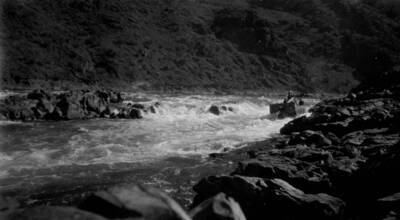A boat navigates the Pincher Rapids and Box on the Salmon River in the Salmon-Challis National Forest.