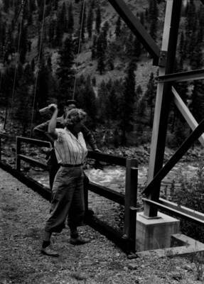 Photo text: 'Frances Zaunmiller and Bruce Groves christening the new Campbell's Ferry Bridge. July 22, 1957.'