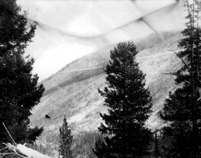 A view across Monumental Creek to Thunder Mountain and road in the Salmon-Challis National Forest.
